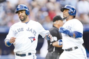 José Bautista y Edwin Encarnación anotaron carreras para Toronto.