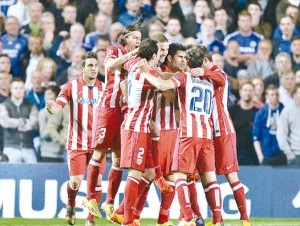 Jugadores del Atlético celebran. (AP )