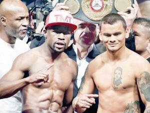 Floyd Mayweather Jr. (izquierda) promete intercambiar golpes con Marcos Maidana hoy en el MGM Grand de Las Vegas. (AP ).