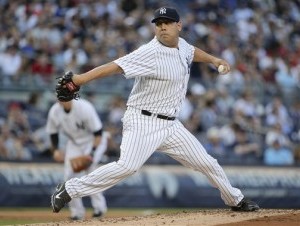 El pitcher Vidal Nuño de los Yanquis de Nueva York envía la pelota al plato frente a los Medias Rojas de Boston, el viernes 27 de junio de 2014, en Nueva York. (Foto AP/Julie Jacobson) (AP .