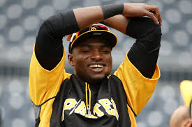 Pittsburgh Pirates' Gregory Polanco stretches during warm ups before a baseball game against the Chicago Cubs in Pittsburgh Tuesday, June 10, 2014. It will be Polanco's Major League debut. (AP