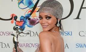 Fashion Icon Award honoree Rihanna poses with her award at the 2014 CFDA Fashion Awards at Alice Tully Hall on Monday, June 2, 2014, in New York.