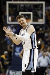 FILE - In this April 26, 2014, file photo, Memphis Grizzlies forward Mike Miller celebrates a score against the Oklahoma City Thunder during overtime in Game 4 of an opening-round NBA basketball playoff game in Memphis, Tenn. A person familiar with the negotiations says the free agent has agreed to a 2-year, $5.5 million contract with the Cleveland Cavaliers, re-uniting him with superstar LeBron James. (AP 