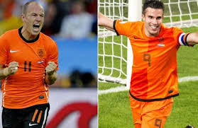 (FILES) These file photos taken during the 2014 FIFA World Cup and made into a combination on July 7, 2014 show (L-R) Netherlands' forward Arjen Robben at the Corinthians Arena in Sao Paulo on June 23, 2014 and Argentina's forward and captain Lionel Messi at Corinthians Arena in Sao Paulo on July 1, 2014. The Netherlands will face Argentina in their 2014 FIFA World Cup semi-final football match at the Corinthians Arena in Sao Paulo on July 8. AFP 